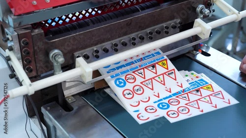 Production Of Self-Adhesive Labels.  Cutting Children's Traffic Rules Stickers