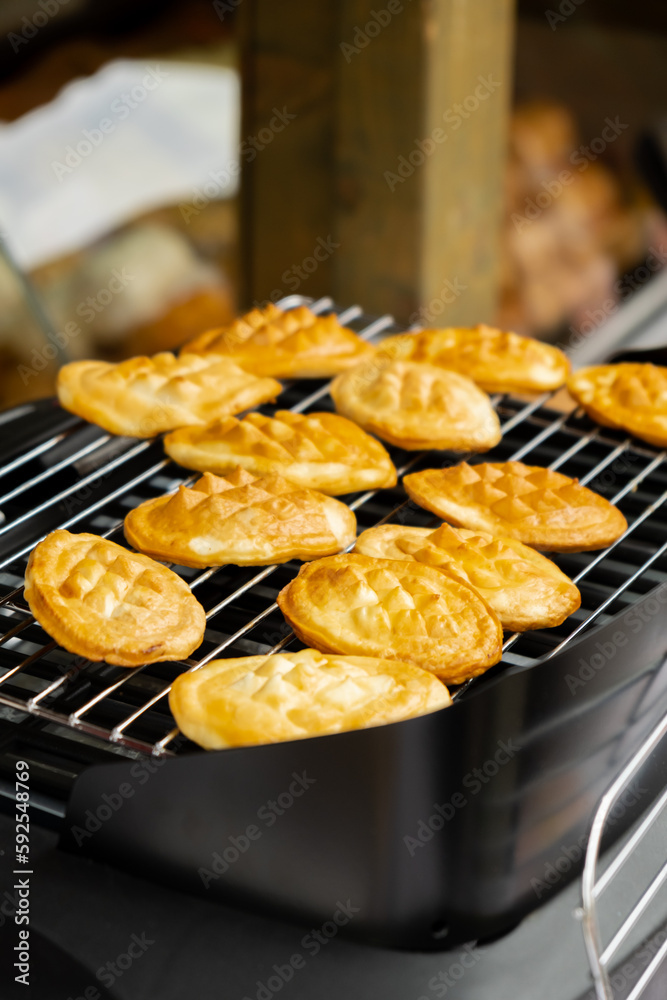 Traditional polish cuisine grilled cheese. Street food market Jarmark St. Dominic in Gdansk Poland. Outdoor Market. Food Event. Food Fair. Festival outdoor cheese on grill. Travel tourist destination Traditional polish cuisine grilled cheese. Street food market Jarmark St. Dominic in Gdansk Poland. Outdoor Market. Food Event. Food Fair. Festival outdoor cheese on grill. Travel tourist destination