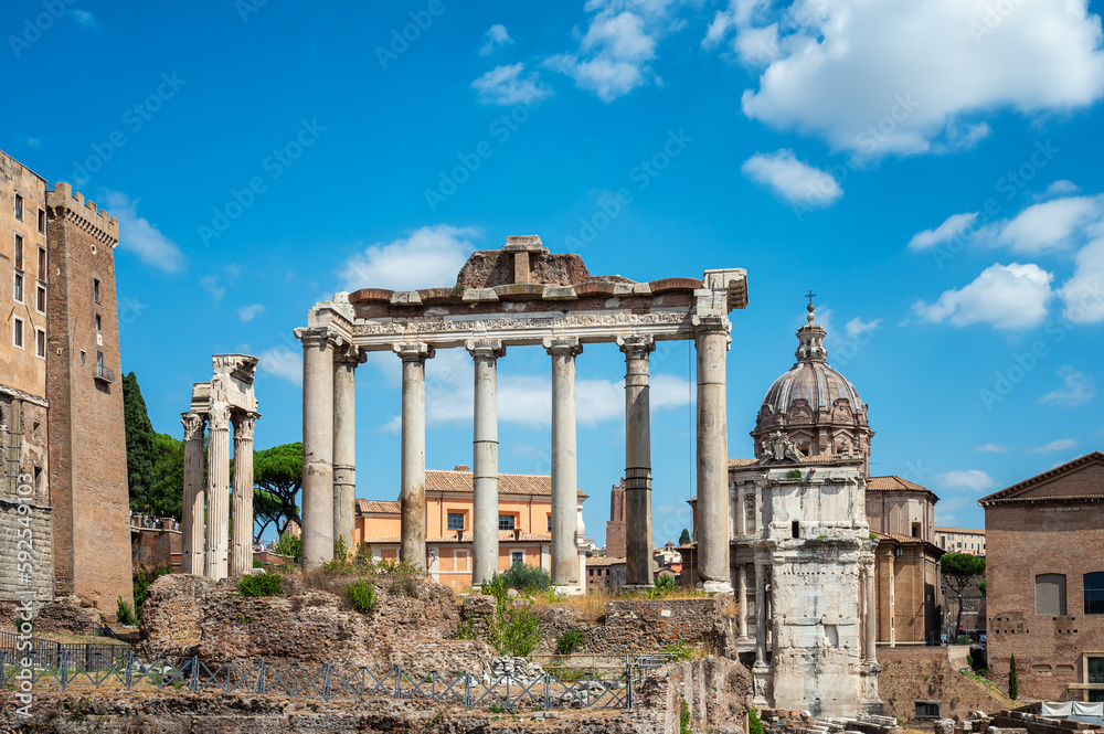 Amazing view of the ruins of the famous Roman Forum (Foro Romano) on a sunny day in Rome, Italy