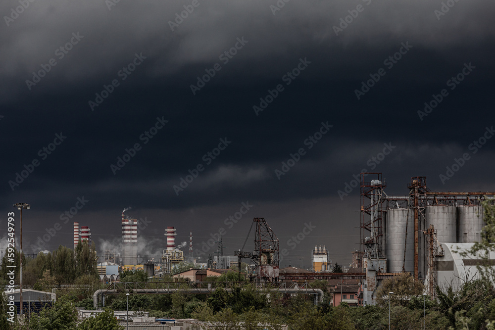 Dark sky and urban pollution near factories