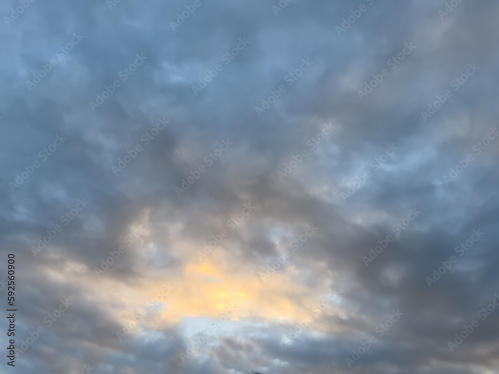 lovely fluffy white clouds in the sky above Sydney NSW Australia at sunset