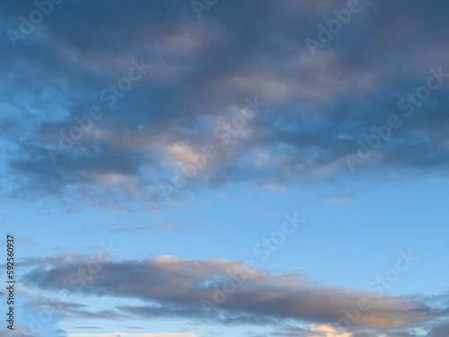 lovely fluffy white clouds in the sky above Sydney NSW Australia at sunset