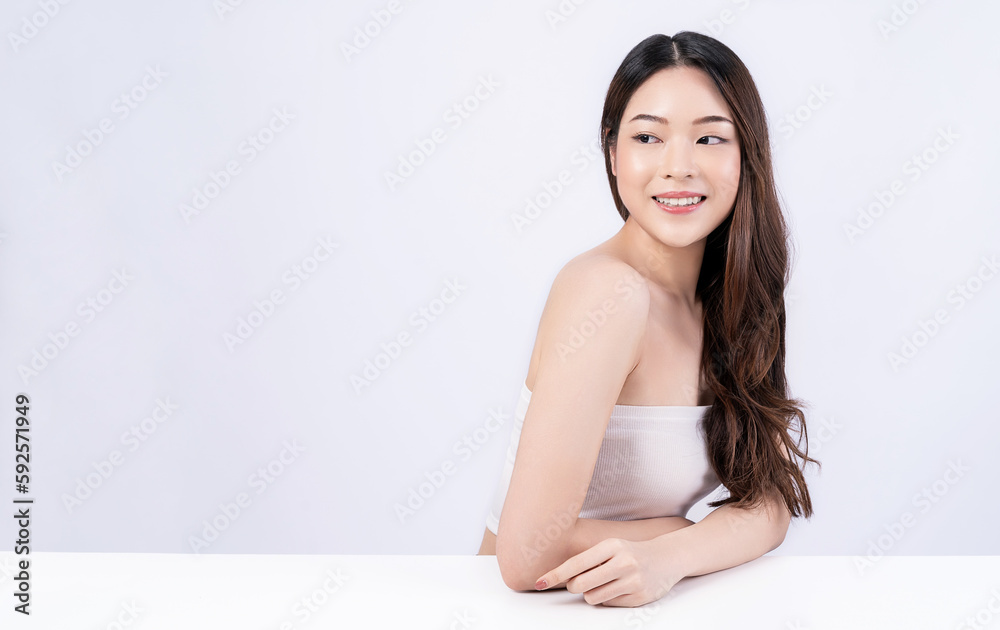 Closeup portrait of beauty asian woman with fair perfect healthy glow skin hand touch shoulder copy space, young beautiful asia girl with pretty smile on face. Beauty korean clinic skincare banner Closeup portrait of beauty asian woman with fair perfect healthy glow skin hand touch shoulder copy space, young beautiful asia girl with pretty smile on face. Beauty korean clinic skincare banner