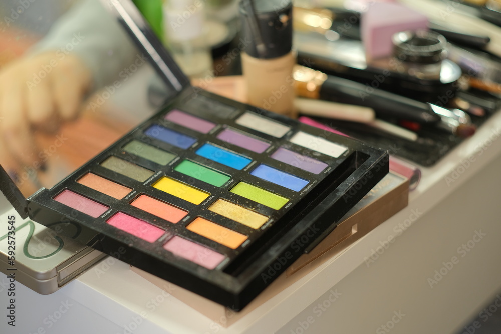 The work of a makeup artist near the makeup table with tools The work of a makeup artist near the makeup table with tools