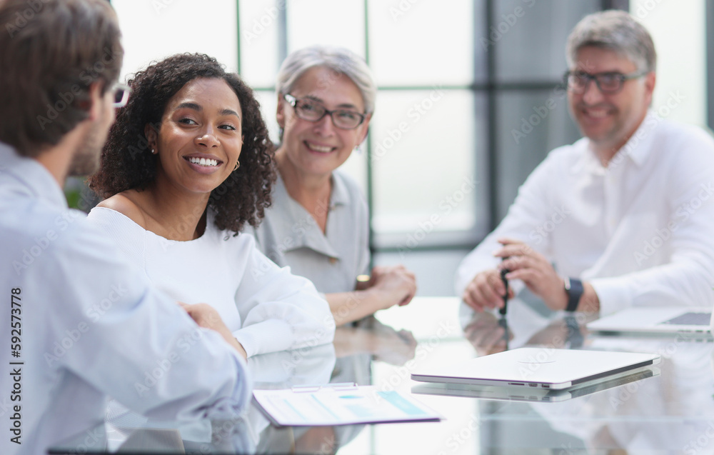 discussion of successful business people in the office