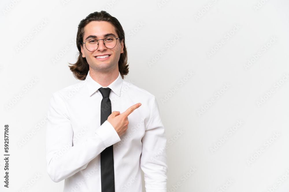Business handsome man isolated on white background pointing to the side to present a product Business handsome man isolated on white background pointing to the side to present a product