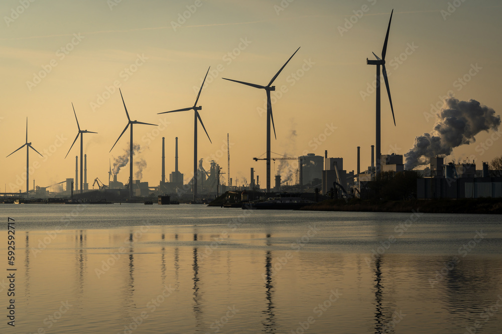 Steel industry and wind turbines along the North Sea Canal at IJmuiden, The Netherlands