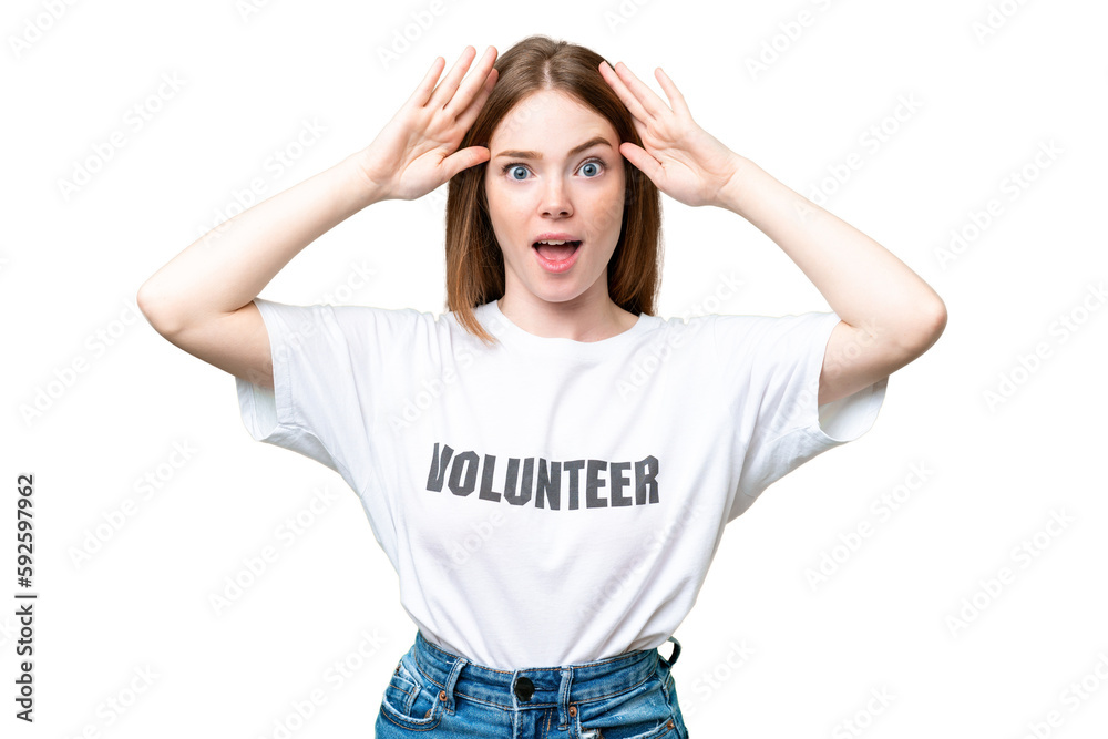Young volunteer woman over isolated chroma key background with surprise expression Young volunteer woman over isolated chroma key background with surprise expression