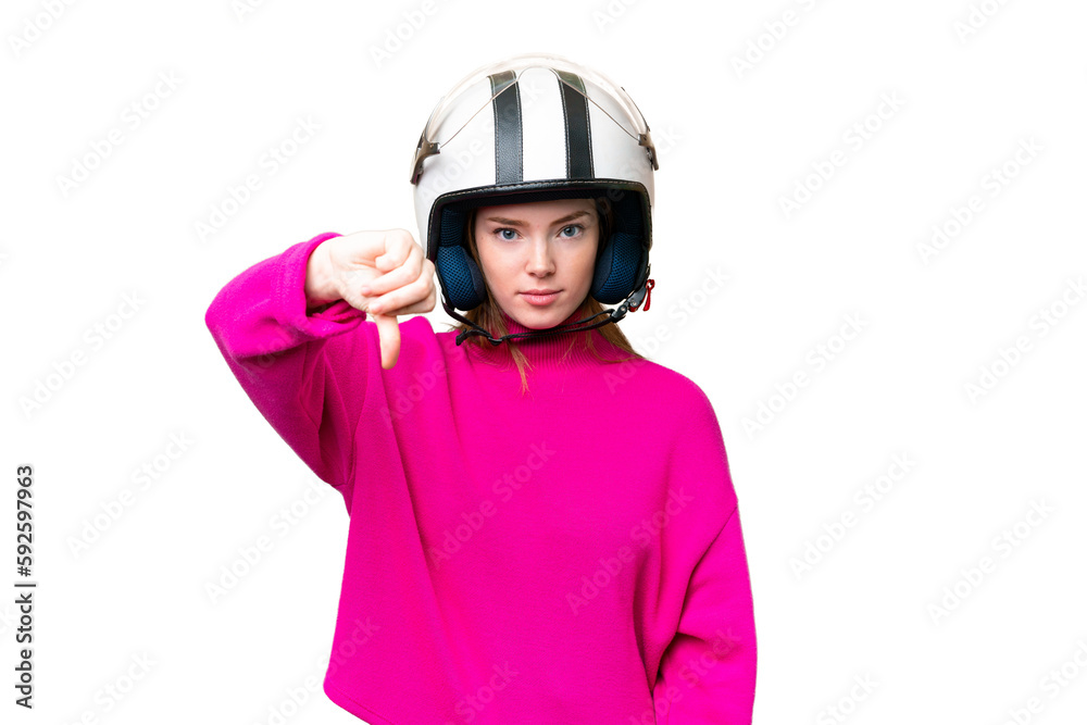 Young pretty woman with a motorcycle helmet over isolated chroma key background showing thumb down with negative expression Young pretty woman with a motorcycle helmet over isolated chroma key background showing thumb down with negative expression