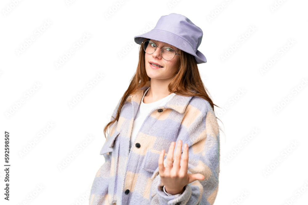 Teenager girl over isolated chroma key background inviting to come with hand. Happy that you came Teenager girl over isolated chroma key background inviting to come with hand. Happy that you came