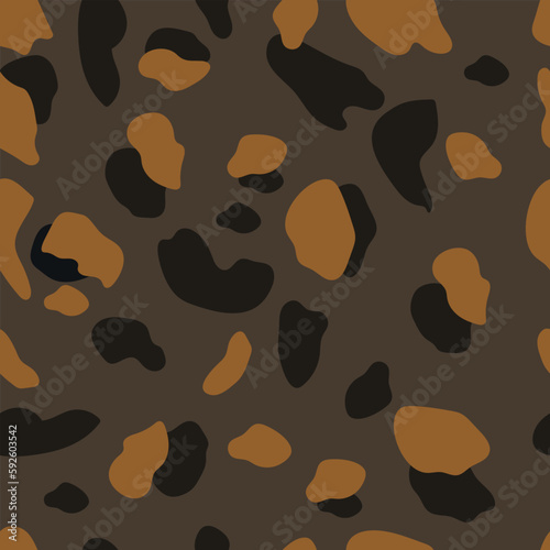 abstract seamless pattern of leopard skin.Brown and black irregular brush spots on a gray background. Abstract print from the skin of wild animals. Simple irregular design.