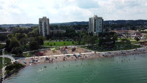 Drone moving around Kempenfelt bay beach in Barrie, Canada photo