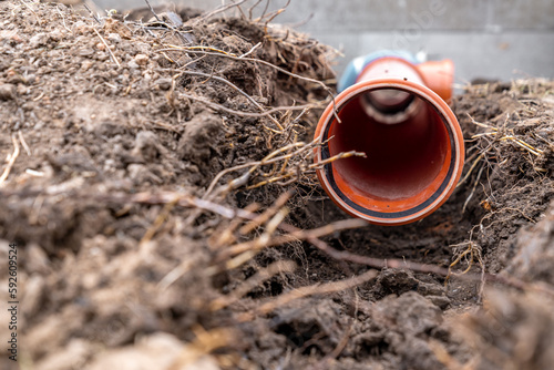 Wallpaper Mural plastic pvc waste sewer pipe in the ground. construction site Torontodigital.ca