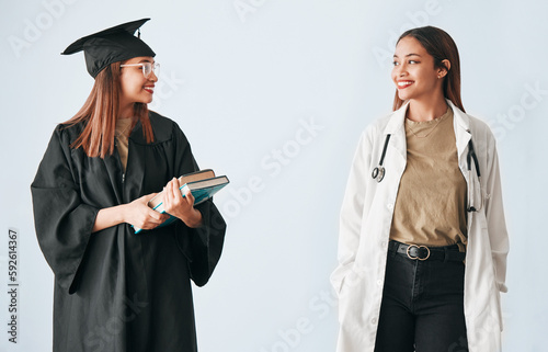 Foto Graduation, medicine and medical student with degree, certificate and diploma achievement isolated in a studio white background