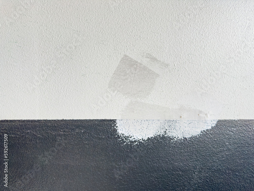White and black paint in the wall