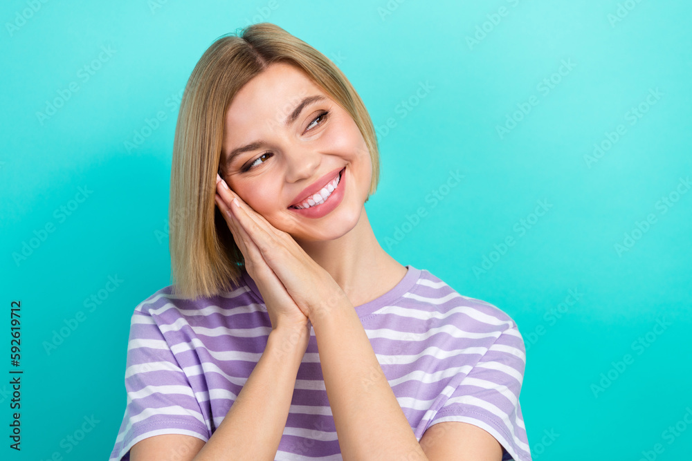 Photo of young pretty girl hands together look empty space enjoy her ceramic veneers dentist ad isolated on aquamarine color background Photo of young pretty girl hands together look empty space enjoy her ceramic veneers dentist ad isolated on aquamarine color background