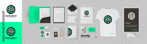 Digital style logo and corporate identity design. Branding presentation of stationery design with brain form minimalistic logo and green background. Set of basic stationery elements for start business