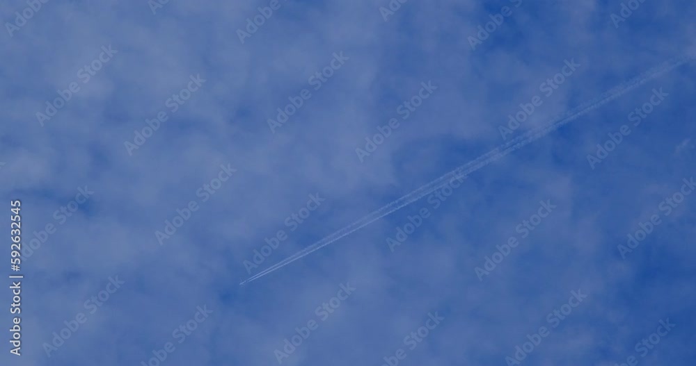 a jet plane in the blue sky with white clouds, 4k dci a jet plane in the blue sky with white clouds, 4k dci