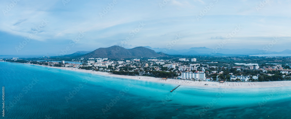 Mallorca sandy beach in Alcudia aerial view.
