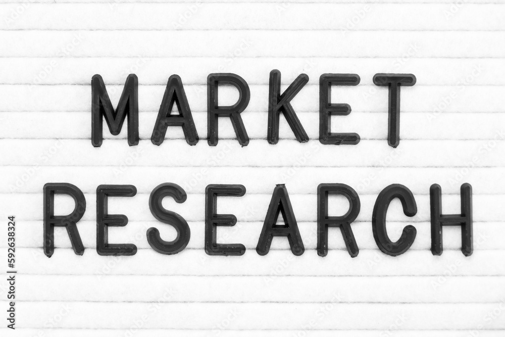 Black color letter in word market research on white felt board background