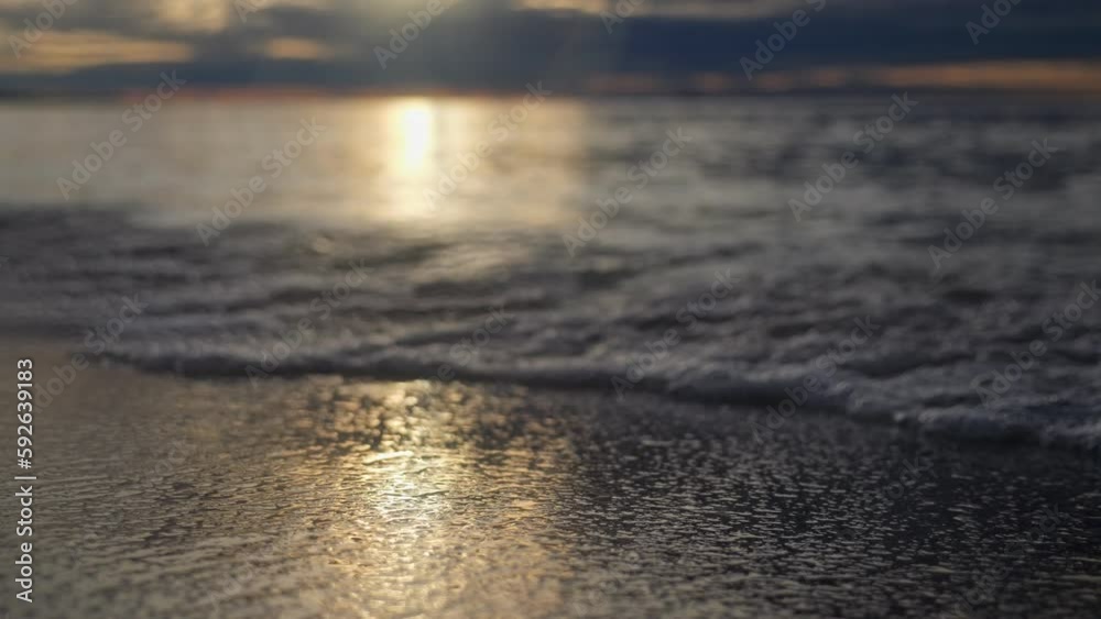 Cameras just above the water surface, the sun is rising. We see the edge of the water, we dive under the water. Sea surface at sunset. Cameras just above the water surface, the sun is rising. We see the edge of the water, we dive under the water. Sea surface at sunset.
