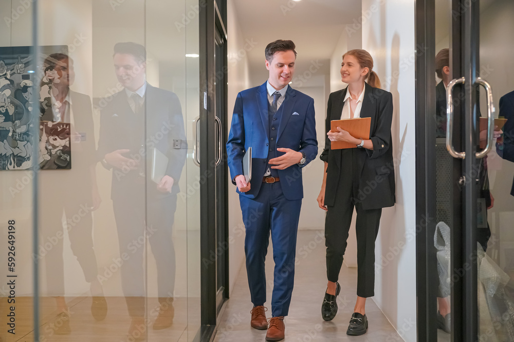 Fototapeta premium Business discussions. Shot of business people discussing and brainstorming in an office