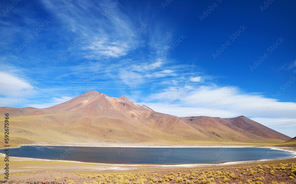 Laguna Miniques, one of stunning deep blue lagoon on the altiplano of Antofagasta region in northern Chile, South America