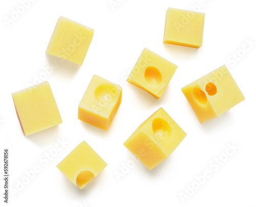 Emmental cheese cubes, isolated on white background, top view