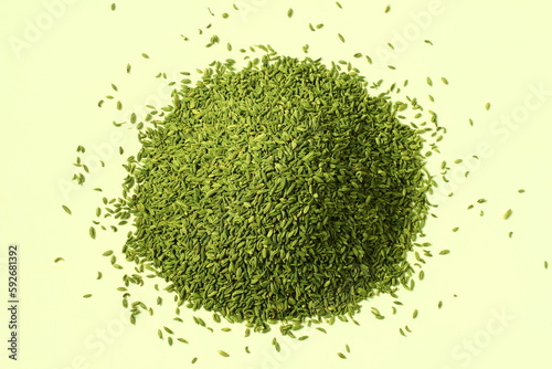 heap of dried green fennel seeds or Saunf herb also known as variyali mukhvas in india isolated on white background,top view photo
