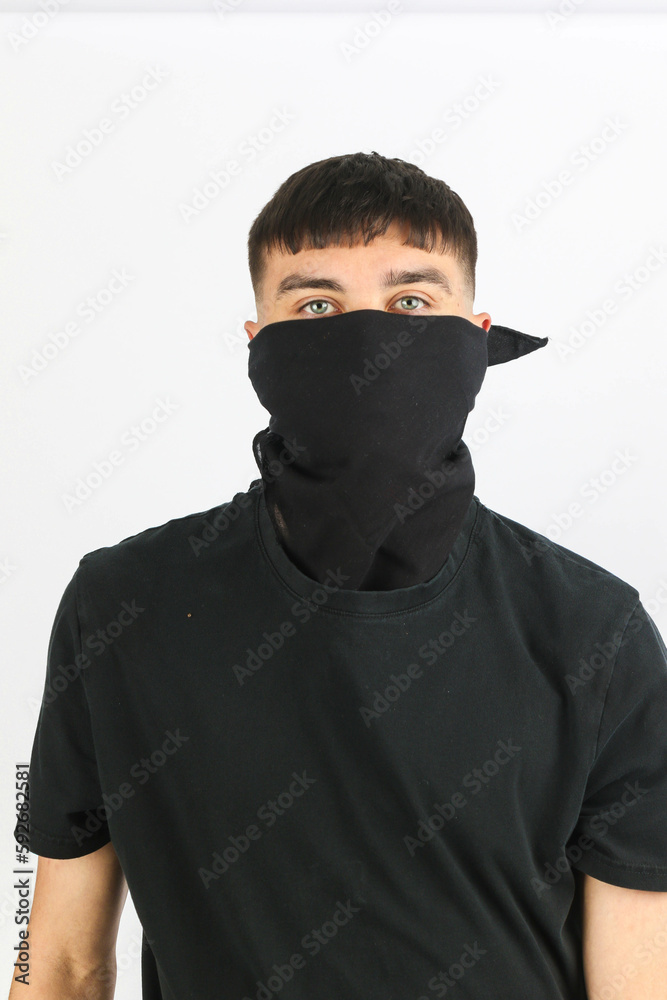 Teenage boy black mask white background Teenage boy black mask white background