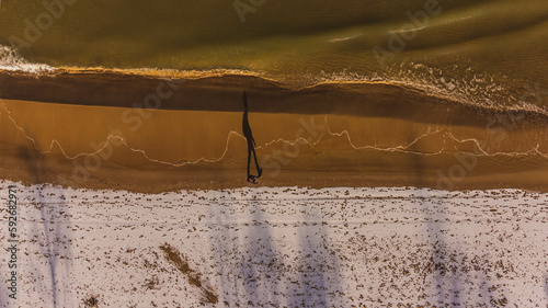 Beach on Sobieszewo Island / Sobieszewo / Gdańsk. Snow covered beach. Drone view. photo