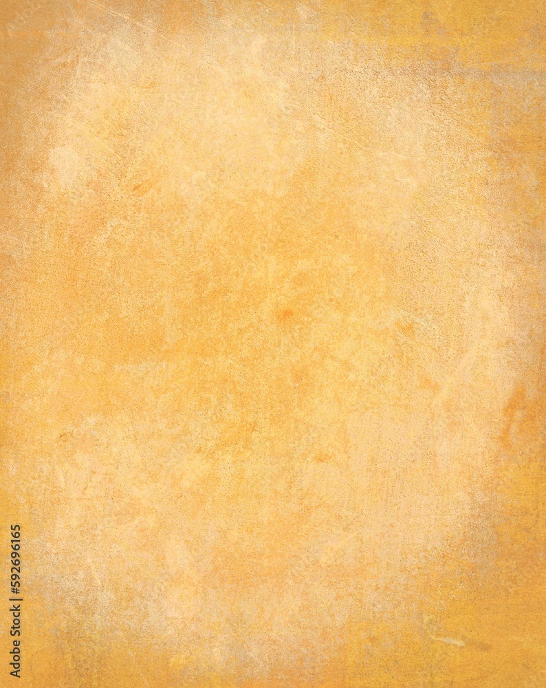 Vertical shot of an abstract wall texture in yellow and beige