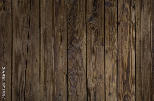 Old wooden plank wall texture aged and darkened over the years