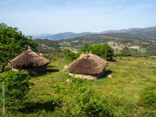 Fortified city of Cossourado (5th to 2nd centuries BC). He belonged to the so-called castro culture. They have rebuilt two houses of the time. Paredes de Coura, Viana do Castelo, Portugal. photo