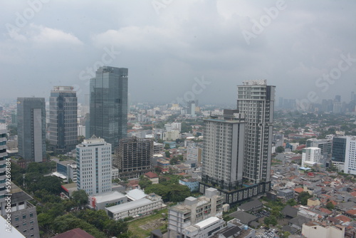 Jakarta, Indonesia - March 3, 2023 - View from the top of the National Library of Indonesia building. Aerial view of Jakarta city, many houses and tall buildings