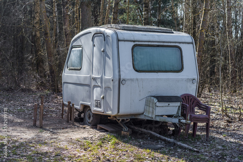 old caravans parked in the forest
