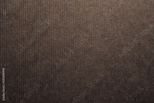 Dark brown colored ribbed craft paper texture