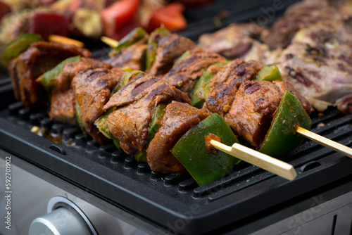 Tableau sur toile view of beef being cooked on a griddle