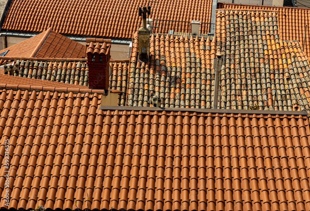 Fototapeta premium Roofs with red tiles, as part of Mediterranean traditional buildings