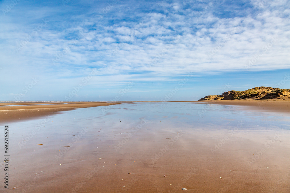 Low tide at Formby beach on a sunny morning