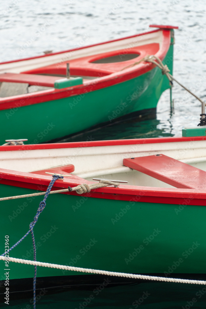 Collioure, Occitania  France - June 8, 2022: Close up of Catalan boats moored at the medieval port