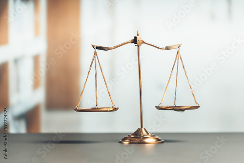Obraz na plátne Shiny golden balanced scale in court library background as concept justice and fairness legal symbol