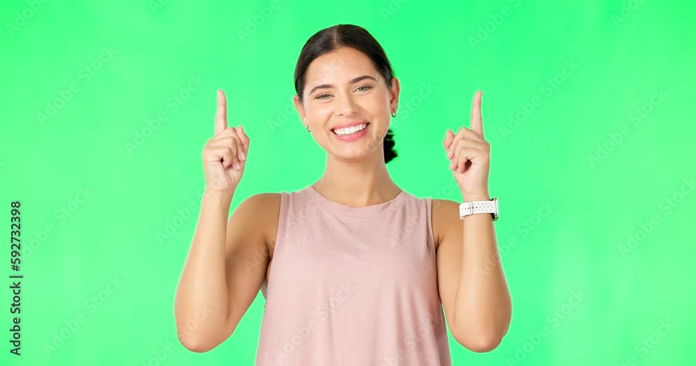 Happy, woman face and fitness green screen pointing up to promotion and product placement. Happiness, workout and female model portrait with smile and commercial in isolated studio background Happy, woman face and fitness green screen pointing up to promotion and product placement. Happiness, workout and female model portrait with smile and commercial in isolated studio background