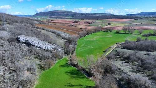 Meanders in the Lucio River in Renedo de la Inera. Aerial view from a drone. Recuevas Valley. World geological heritage UNESCO. Las Loras Geopark. Palencia. Castile and Leon. Spain, Europe photo