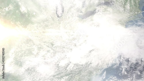 Earth zoom in from outer space to city. Zooming on Georgetown, Kentucky, USA. The animation continues by zoom out through clouds and atmosphere into space. Images from NASA photo