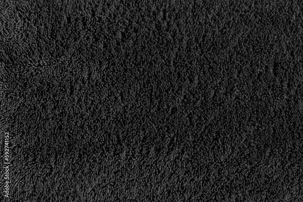 Fototapeta premium texture of dark gray terry cloth fabric. close up of a towel terry cloth
