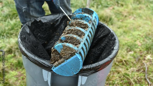 Man holding a Tuf -  filter of septic system tank and water wells.  Inspection, maintenance and repair septic tank. photo