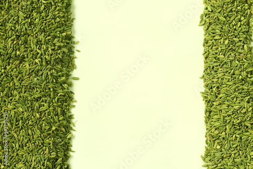 dried green fennel seeds or Saunf herb also known as variyali mukhvas in india isolated on white background,top view with copy space photo