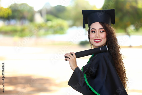 girl graduating, woman graduating, graduation, smiling, celebration, victory, gown, graduating woman, commencement, degree, diploma