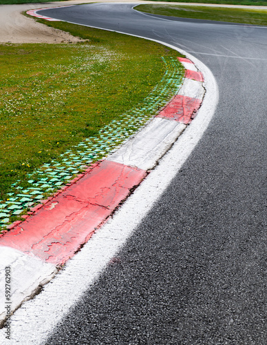 Motor sport asphalt race track double turn and curbs close up © fabioderby